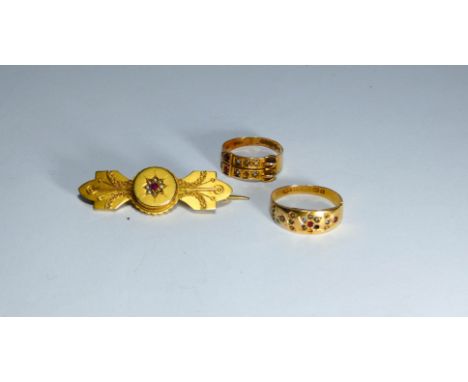 Two 15ct gold Victorian rings, one is a buckle design ring set with ruby and pearls, the other a gypsy style ring and a 15ct 