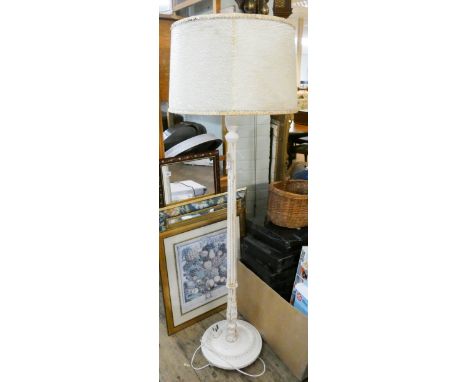 A cream painted reeded column standard lamp with shade 