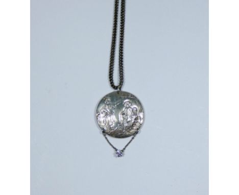 Vintage silver and diamond pendant, the circular silver disc decorated with pastoral scene with claw set diamond suspended fr