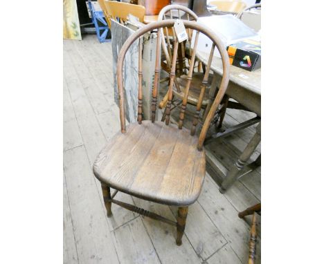 A set of 6 rounded stick back Windsor style dining room chairs   There are 2 pieces of timber screwed to the undersides of ea