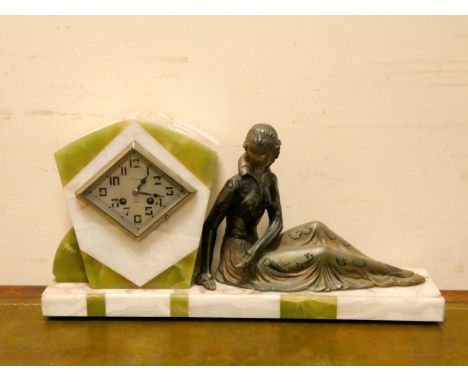 Art Deco style French striking mantle clock with lady figure mount in a white and green marble case 