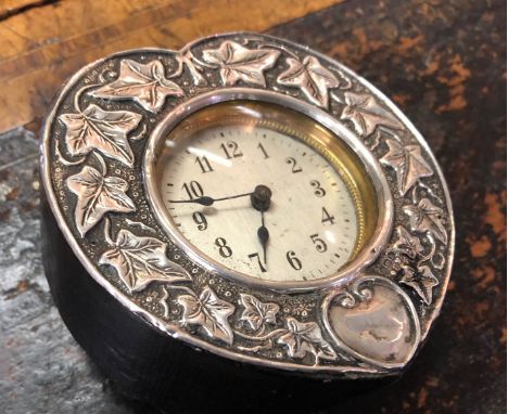 An Edwardian Art Nouveau heart shaped silver timepiece, decorated with ivy leaves, Birmingham 1907, an Edwardian silver tanka