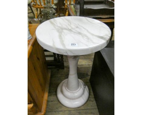 A cream patterned marble lamp or plant pedestal 