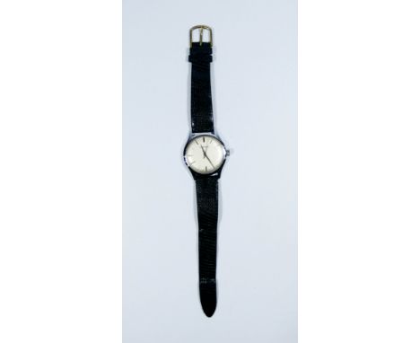 A gents vintage Garrard automatic wrist watch in stainless steel with black leather strap with Garrards box 