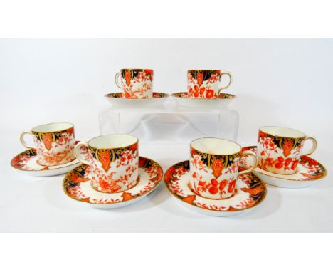 A set of six Royal Crown Derby cabinet coffee cups and saucers 