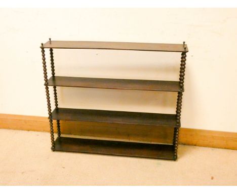 A Victorian four tier bobbin turned mahogany wall shelf, 2'6 wide