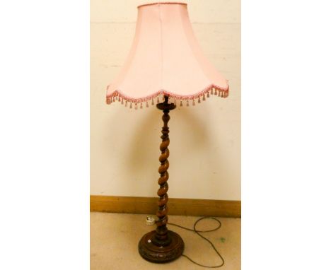 A low barley twist column lamp standard with pink shade, approximately 50" tall to the top of the shade 