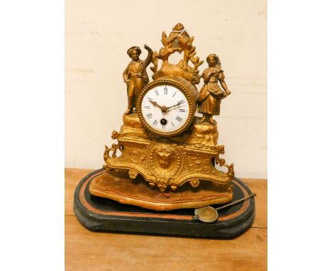 A French gilt figure mounted mantle clock