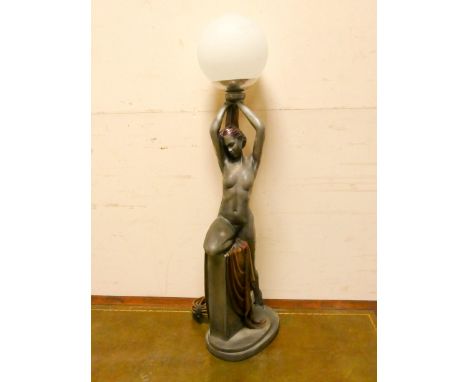 A 1930's Art Deco dancing girl with ball figure table lamp 28" tall   Height approximately 28”.The item is resin and it appea