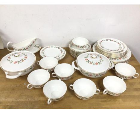 A Wedgwood India Rose pattern dinner service, including eight dinner plates (26cm), eight side plates, eight soup bowls with 