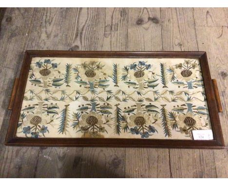 An embroidered foliate design panel within a two handled tray (30cm x 59cm)