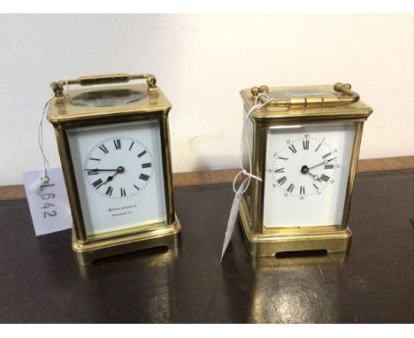 An early 20thc brass and four glass carriage clock, the white enamelled dial with roman chapter ring inscribed Arnold and Lew