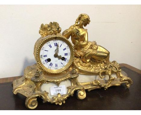 A late 19thc/early 20thc French figural cast gilt metal and alabaster mantel clock, white enamel dial with Roman and Arabic c