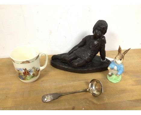 A mixed lot including a composition figure of a Girl Reclining (15cm), a Beswick figure of Peter Rabbit, Bunnykins mug and an