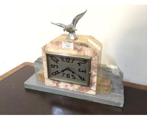 An Art Deco period marble mantel clock by F. Marti, the silvered dial with arabic chapter ring, twin train drum movement stri