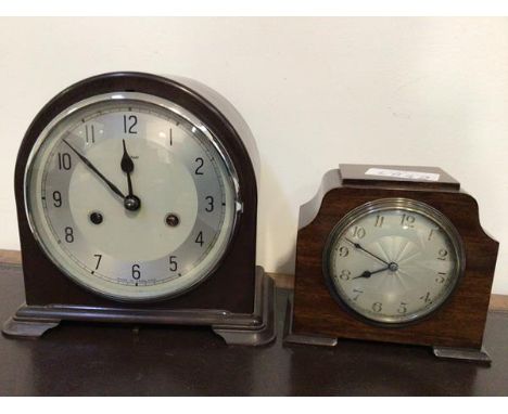 A vintage Enfield mantel clock in a bakelite case with silvered dial, striking hammer on coil together with another mantel cl