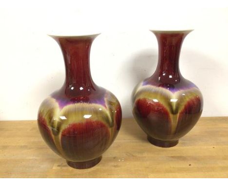 A pair of modern Chinese vases, of baluster form with abstract decoration, stamp to base (34cm)