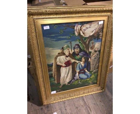 A tapestry panel depicting a Biblical Scene in elaborate frame (65cm x 48cm)