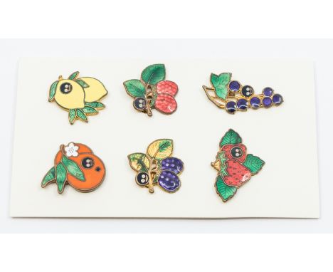 A collection of six Miller, Branston Street, Birmingham, pre-war Golly enamelled fruit badges. Registered 768905. These items