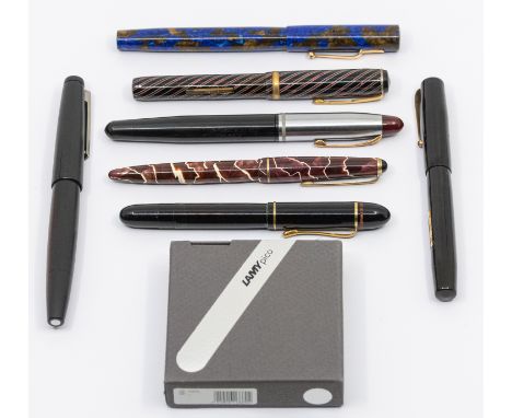 A collection of fountain pens to include: Mabie Todd &amp; Co Blackbird self filling black and gilt fountain pen with 14ct go