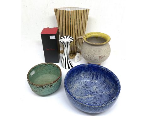 Studio pottery comprising stoneware bowl with blue speckled glaze, diameter approx 20cm, terracotta jug with cream matt body 