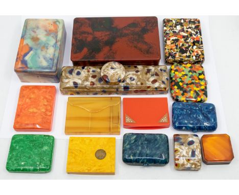 A selection of mixed bakelite or celluloid mid 20th century boxes to include; a large two division red and black trinket / ci