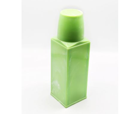 An Art Deco green Bakelite Thermos flask, comprising a pillar shape, in green marbled Bakelite, with removable drinking cup, 