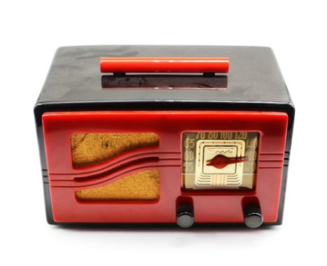 Motorola S Grill catalin radio, model 51 x 15 in black and red case with retracting carry handle, 1941. Case size approx 24.5