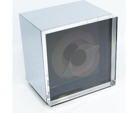 A Vintage 1970s Prisma clock by Kirsch Hamilton, stylish cube shaped, chrome surround, label verso made in USA, dated 1976. U