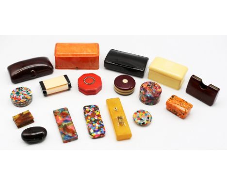 A small collection of bakelite boxes to include; an orange jewellers box, watch holder in fabric inside and Sheppard Bros of 
