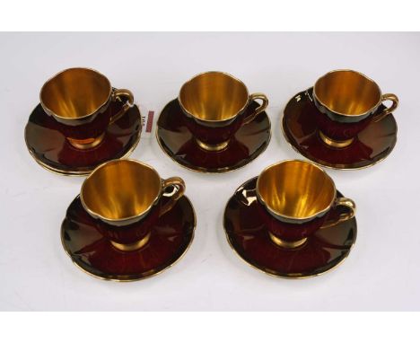 A set of five Carltonware Rouge Royale coffee cans and saucers