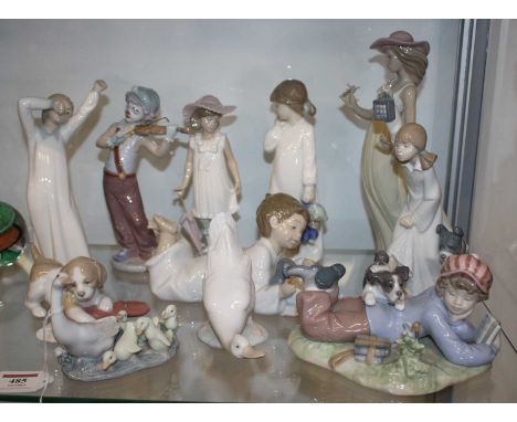 A collection of Lladro and Nao porcelain figures, the largest h.27cm (11)