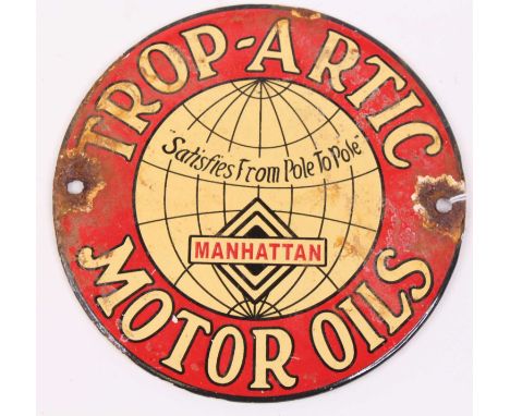 A Trop-Artic Manhattan Motor Oils enamel advertising sign, dia.15cm