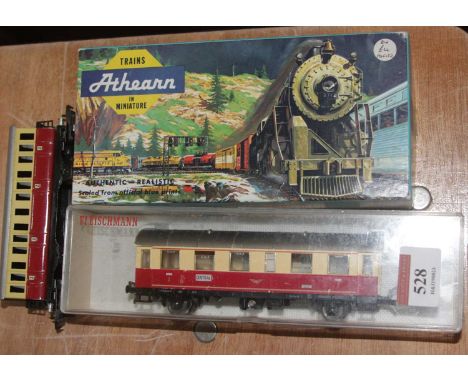 Four model railway carriages, to include Fleischmann