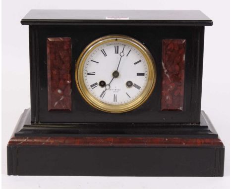 A Victorian slate and rouge marble mantel clock, the enamel dial showing Roman numerals, having an eight-day movement, h.22cm