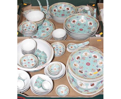 A Chinese porcelain part dinner service, enamel decorated upon a blue groundA few small chips and some rubbing to the enamel 