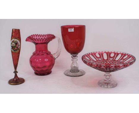 A 19th century ruby overlaid glass vase, h.30cm; together with three further pieces of cranberry glassware 