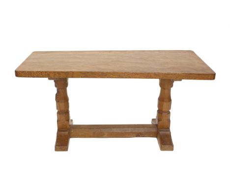 Robert 'Mouseman' Thompson of Kilburn rectangular oak coffee table with adzed top on octagonal twin-end supports and stretche