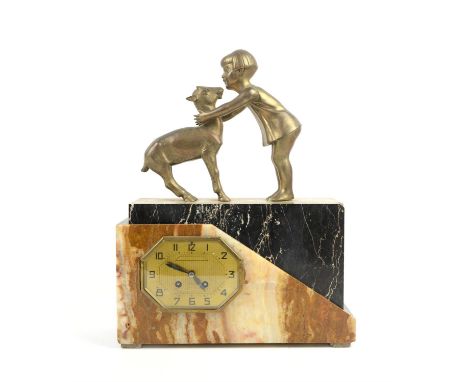 Art Deco clock mounted with figure of a child embracing a fawn, gilt dial, on black and mottled brown and cream marbleProvena