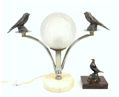 Art Deco bird lamp with chrome branches supporting two birds mounted either side of textured opaque glass globe, on circular 