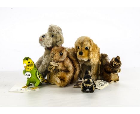 A Collection of Steiff Animals, Budgie in green, yellow and black, Salamander in dark grey and yellow, together in a small St