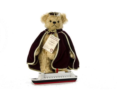 A Hermann Queen Mary II Celebration Bear, limited edition numbered 21 of 950, dressed in velvet cloak and crown with a foil t