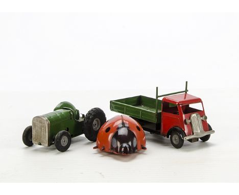 A Tri-ang Minic clockwork ladybird, together with clockwork tractor and open lorry, F-G (3)