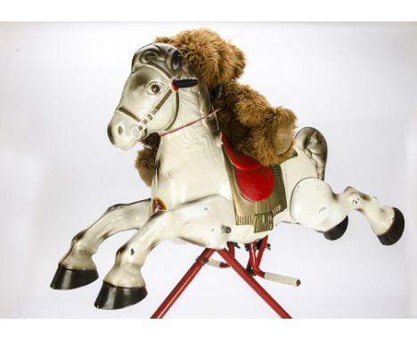 A 1960's Mobo 'Prairie King' Rocking Horse, sprung white tin body with red and gold saddle, together with a modern Harrods Te