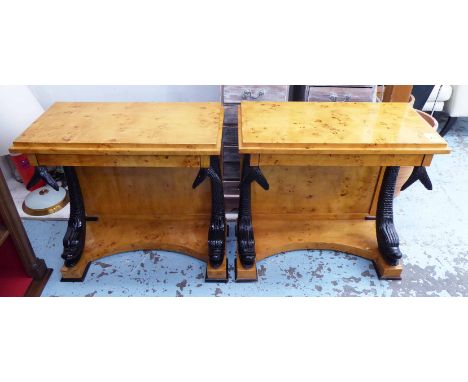 CONSOLE TABLES, a pair, Biedermeier style, birds eye maple, with single long drawer and ebonised fish supports, 86cm x 82cm H