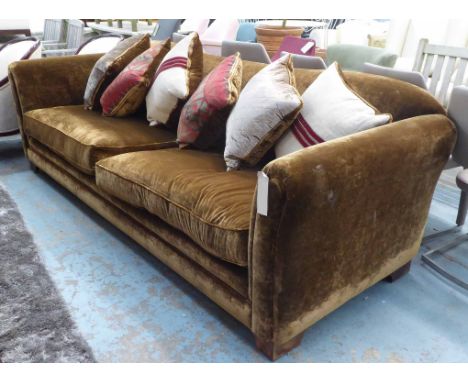 SOFA, of large proportions in chocolate brown velvet, 251cm W x 79cm H x 113cm D, with six scatter cushions.