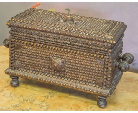 RARE TRAMP ART TEA CADDY, late 19th century with overall geometric carving, 21cm H x 35cm x 15cm.