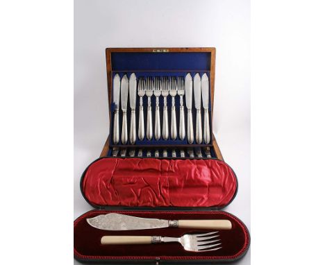 A CASED PAIR OF LATE VICTORIAN ENGRAVED FISH SERVERS with ivory handles, by H. Wilkinson, Sheffield 1897 together with a case