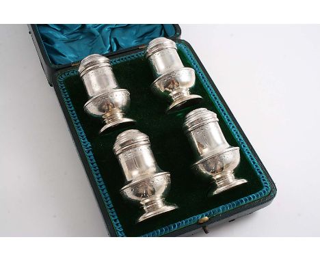 A CASED SET OF FOUR ENGRAVED BUN-TOP PEPPER CASTERS with engraved friezes around the body and neck, by R. Halford & Sons, Lon