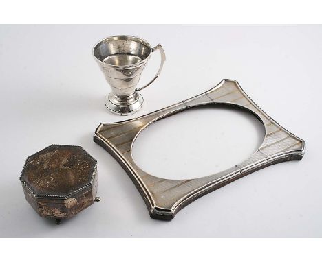 AN OCTAGONAL JEWEL BOX on four feet, lined & loaded, by A & J. Zimmerman, Birmingham 1915, an Art Deco mug and an engine-turn